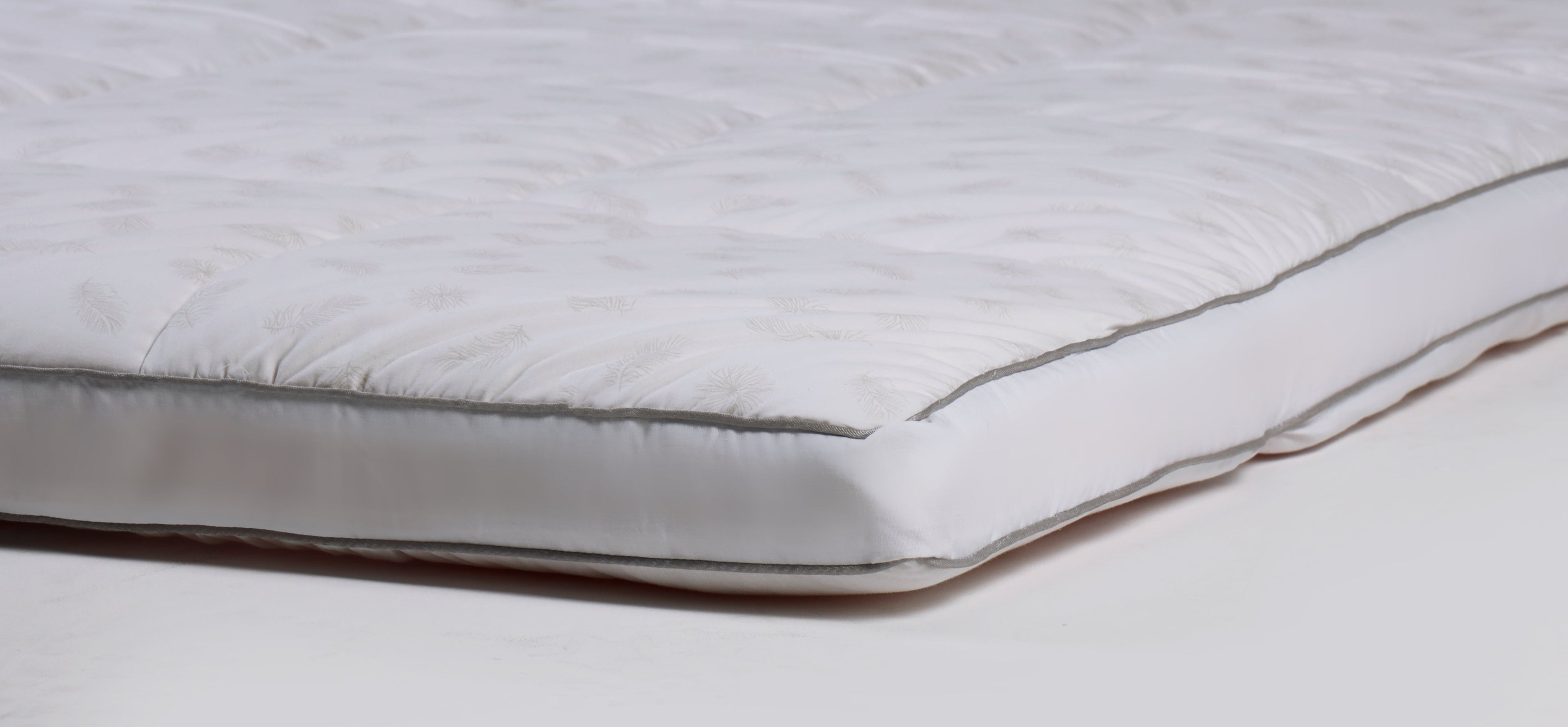 The Nuvola Mattress Topper + El Conforto Pillow