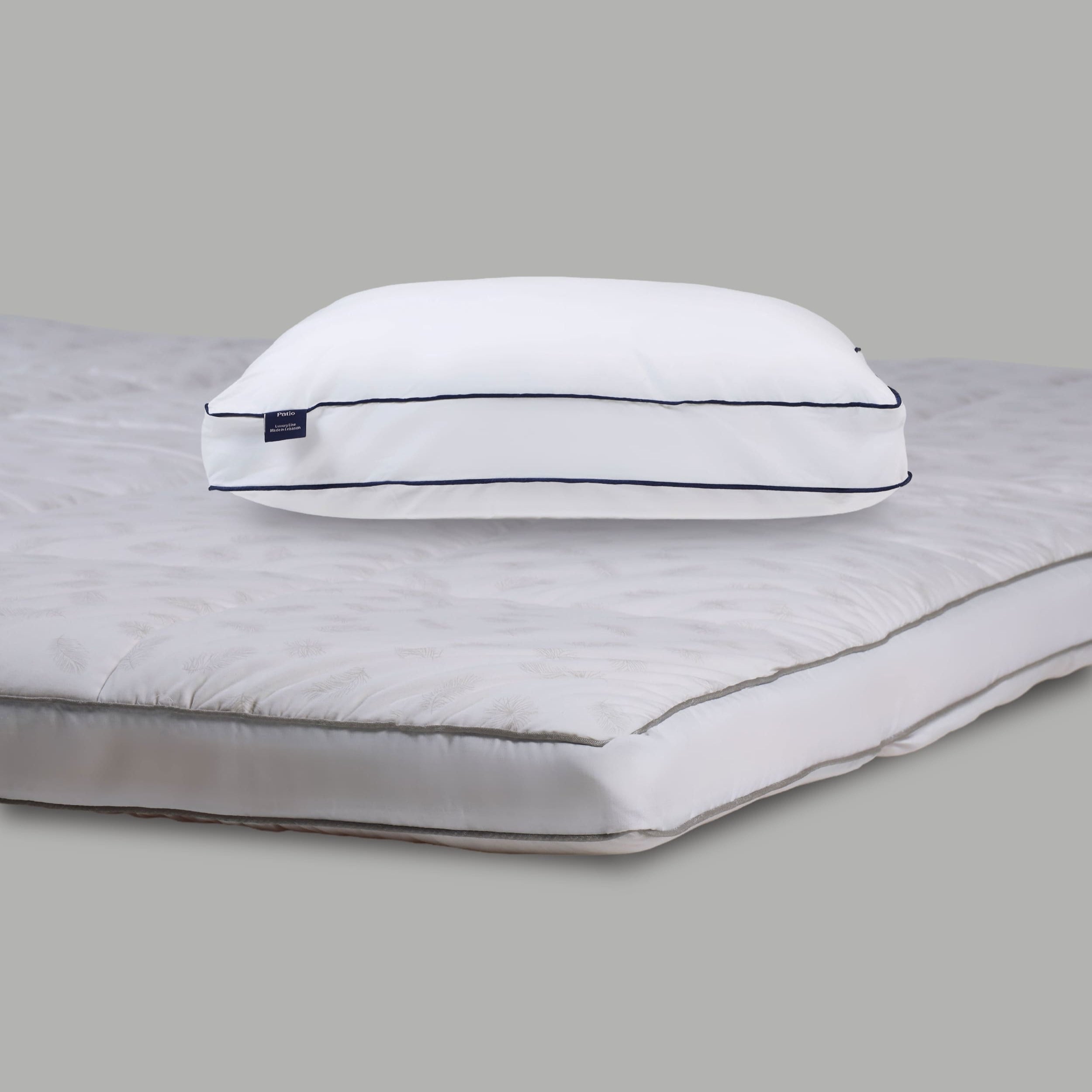 The Nuvola Mattress Topper + La Carezza Medical Pillow