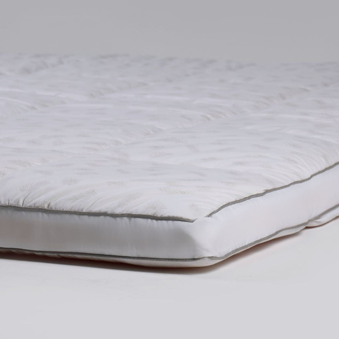 The Nuvola Mattress Topper + La Carezza Medical Pillow