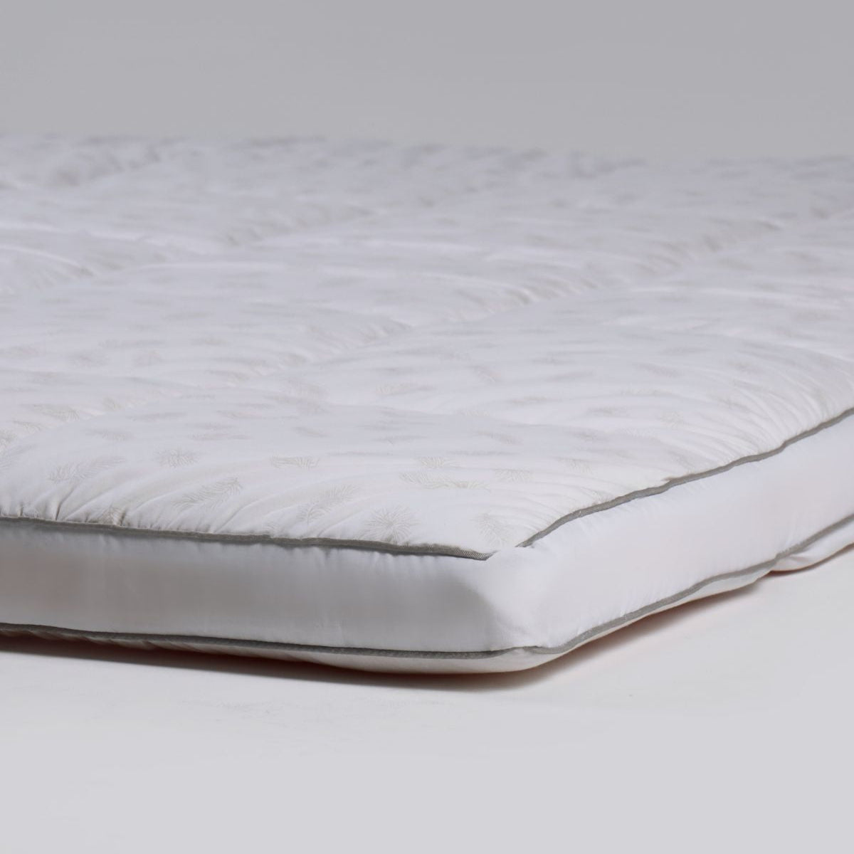 The Nuvola Mattress Topper + La Carezza Medical Pillow