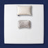 The Orthopedic Recovery Set - memory foam mattress topper, support pillow and knee pillow arranged on a made bed, viewed from above